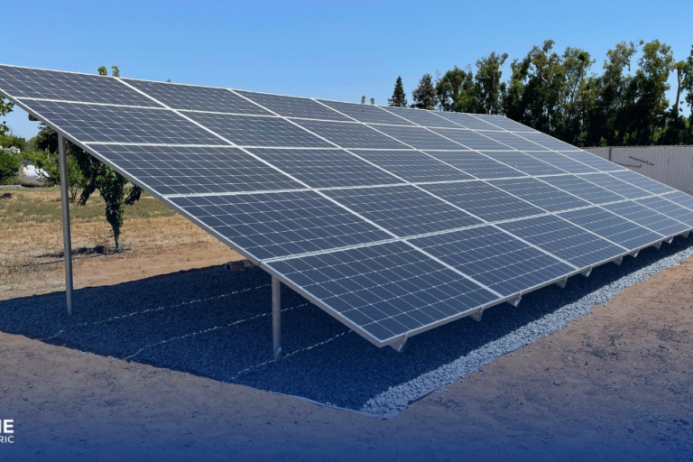 Yes, We Install Ground Mounted Solar Panels - A side view of a ground mounted solar panel in an agricultural field.