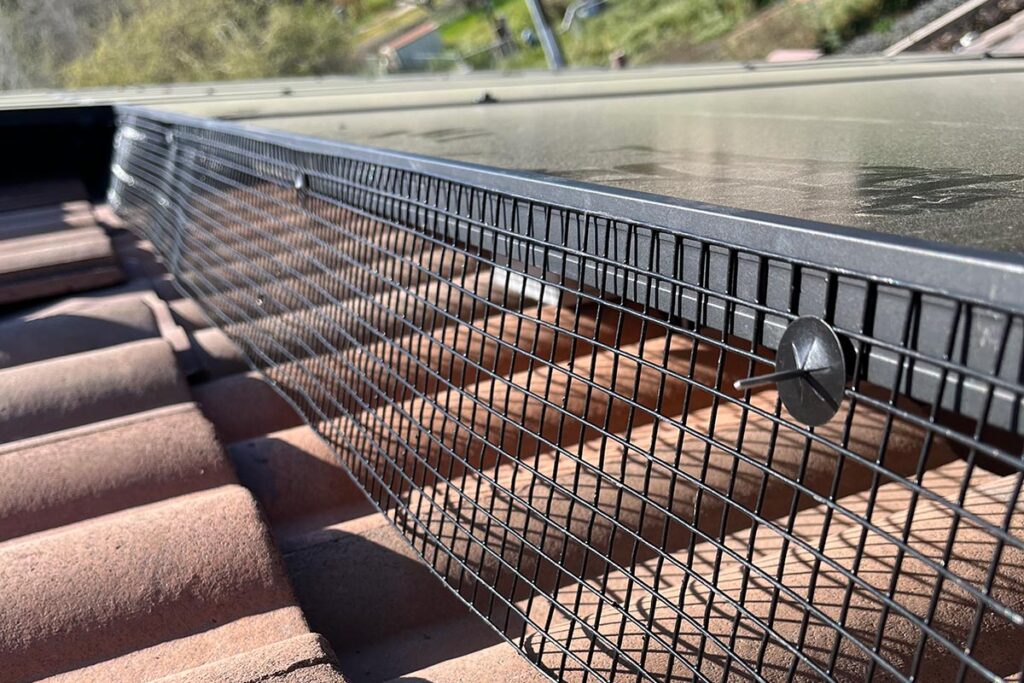 Critter guards for solar panels